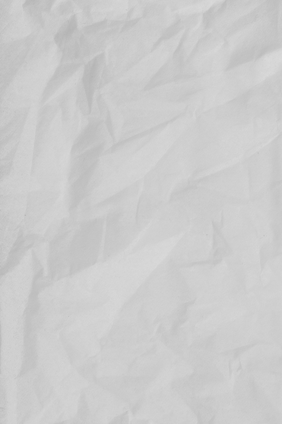 Close paper surface, standing in for structured financial reporting packs.